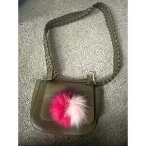Jules Kae Zoey crossbody green pink Pom Pom 
Woven strap